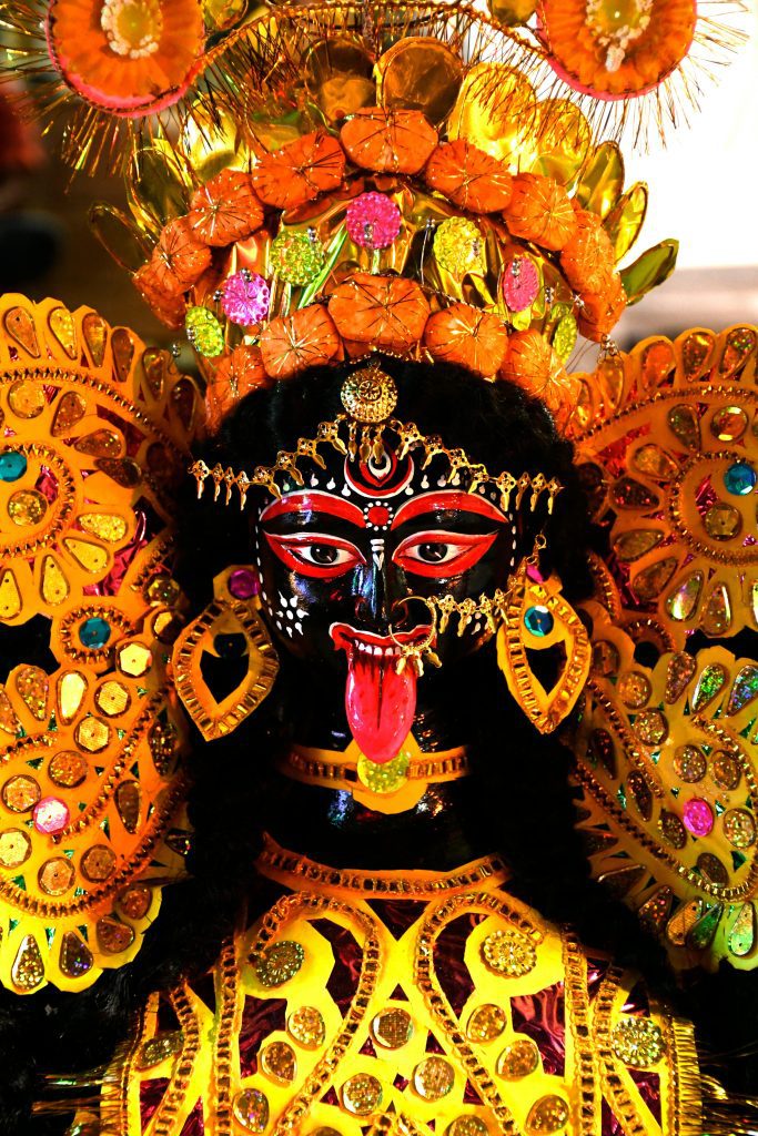 kalika Close-up of a colorful statue of Goddess Kalika, showcasing intricate details and vibrant colors, in Kolkata, India.