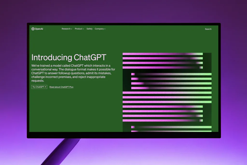 Chatgpt OpenAI Website with Introduction to ChatGPT on Computer Monitor where it is shown to use AI for SMEs.