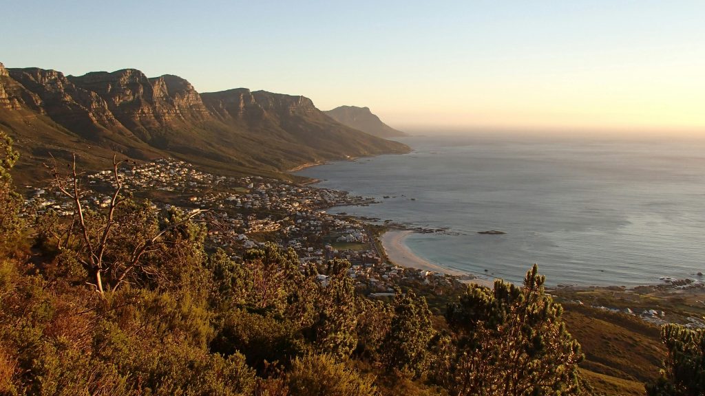 pexels-photo-51809-51809 Beautiful panoramic view of Cape Town's coastline with mountains and ocean during sunset.